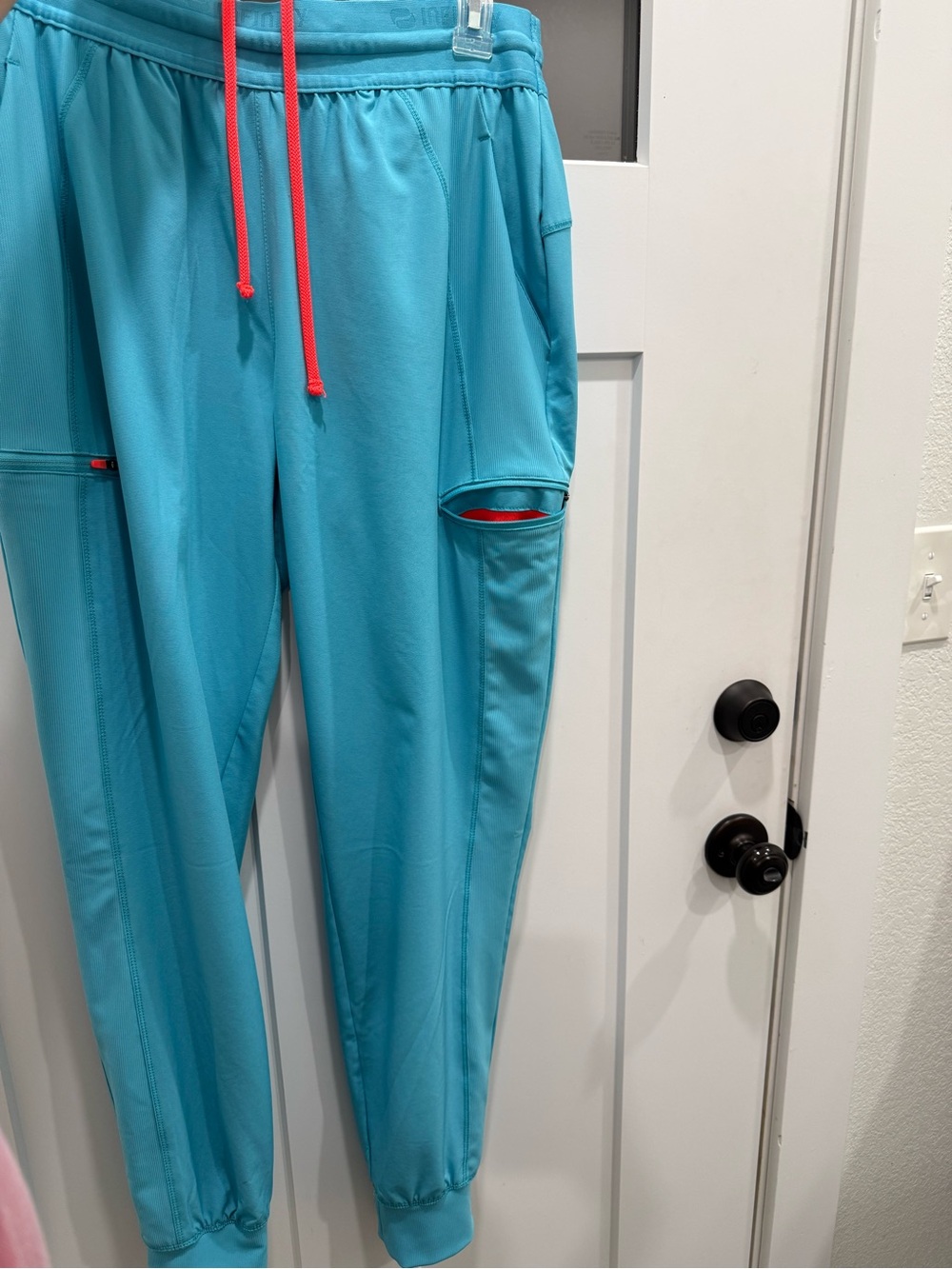 NFINITY Turquoise Joggers with Coral Drawcord